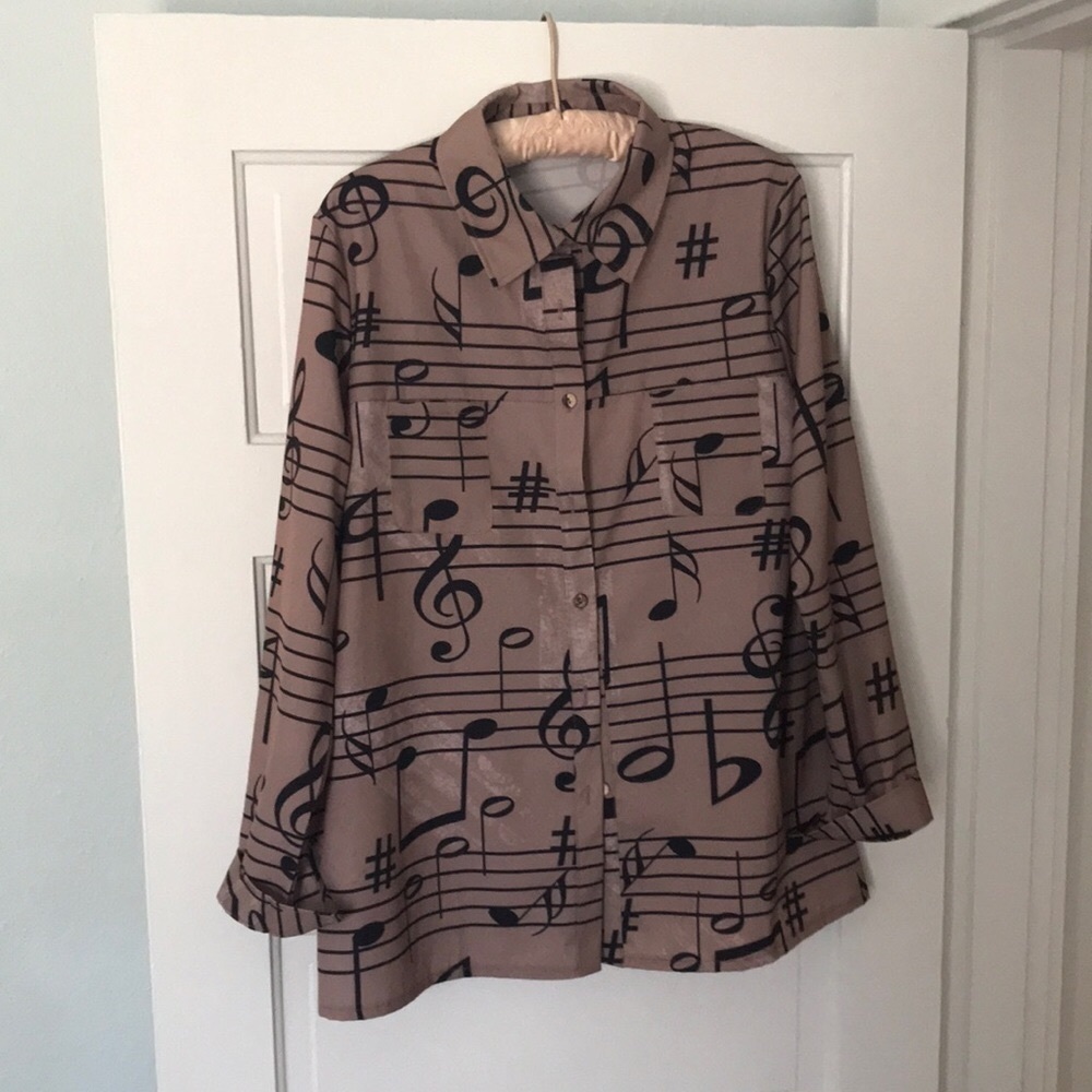 Music themed blouse. Works well as an overshirt.